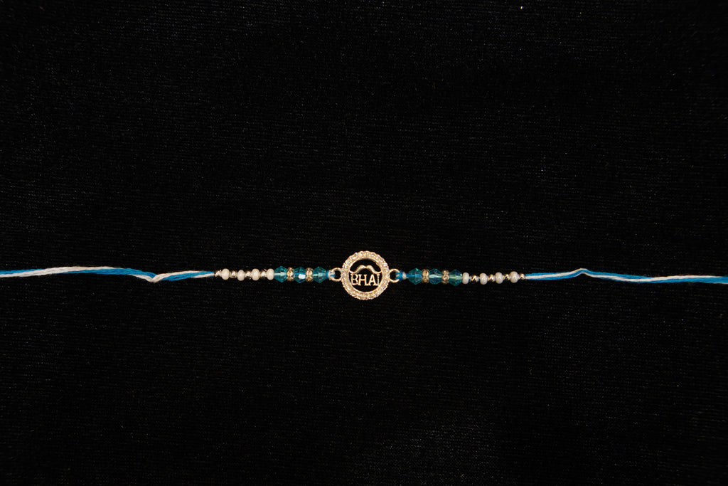 Silver Rakhi with Roli Chawal