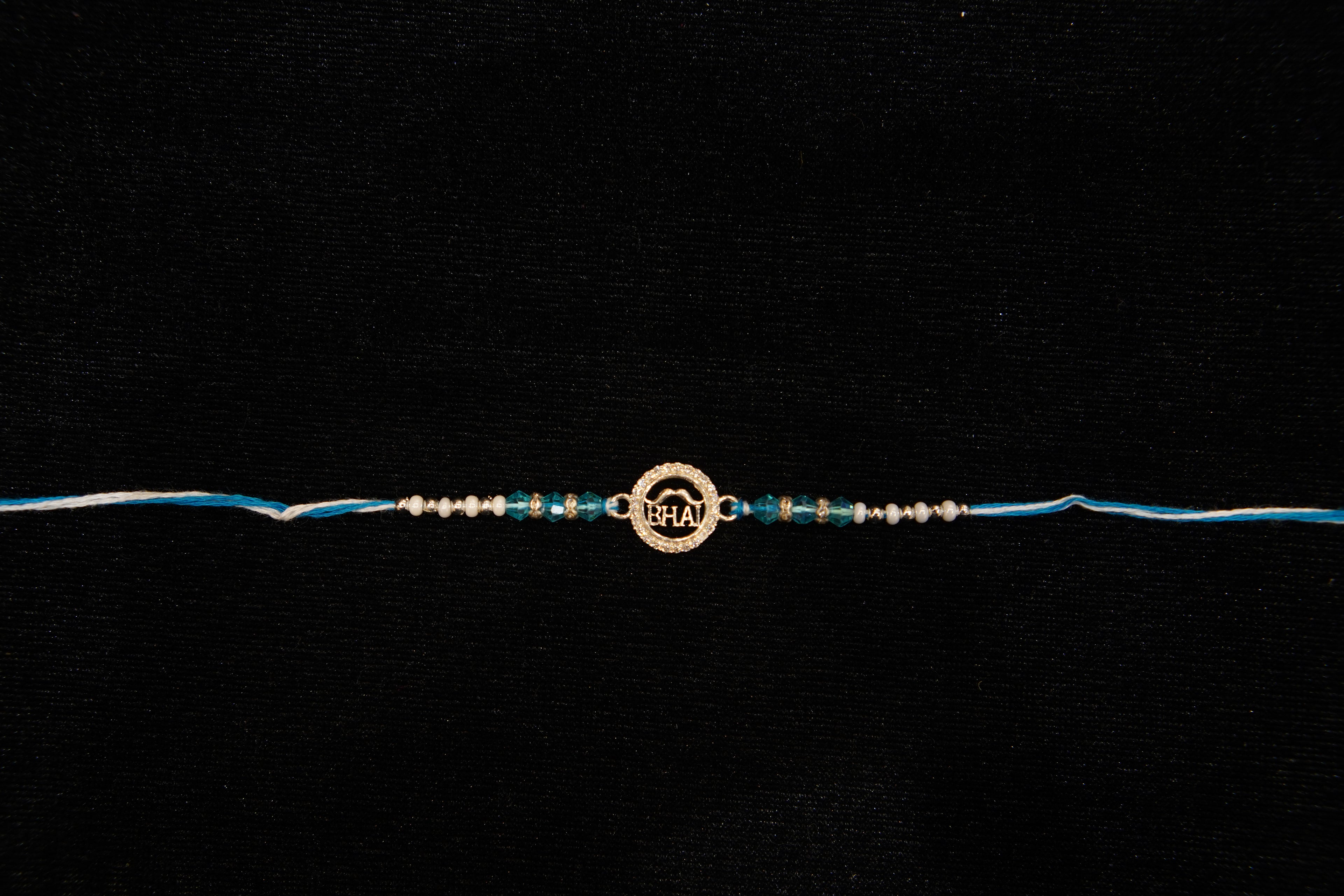 Silver Rakhi with Roli Chawal