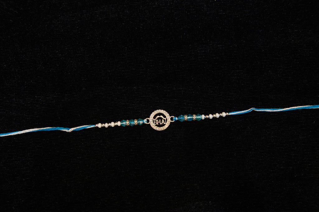 Silver Rakhi with Roli Chawal