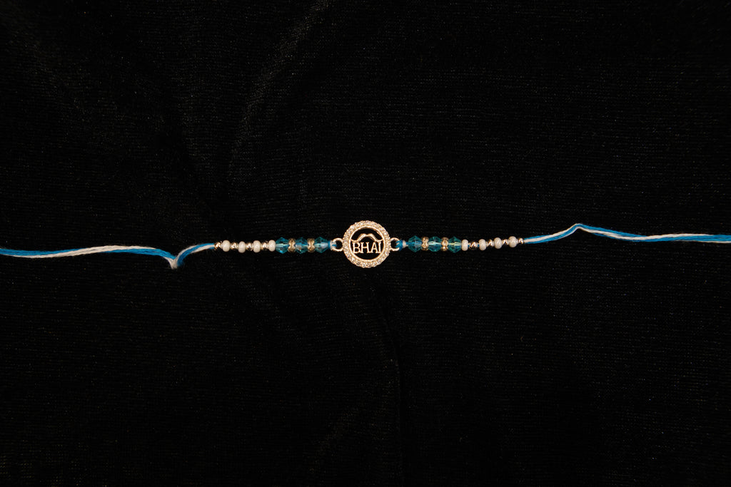 Silver Rakhi with Roli Chawal