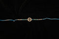 Silver Rakhi with Roli Chawal