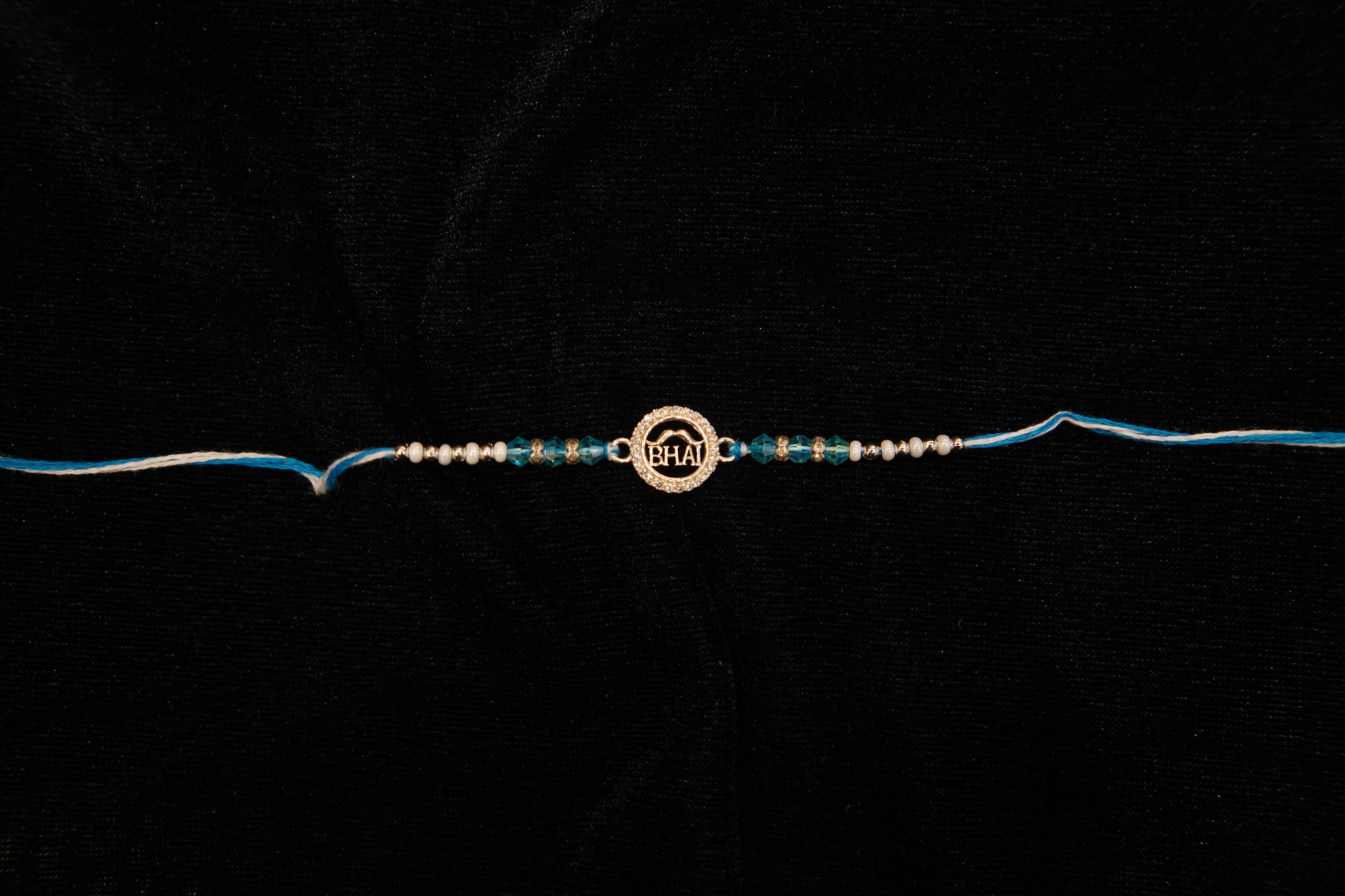 Silver Rakhi with Roli Chawal