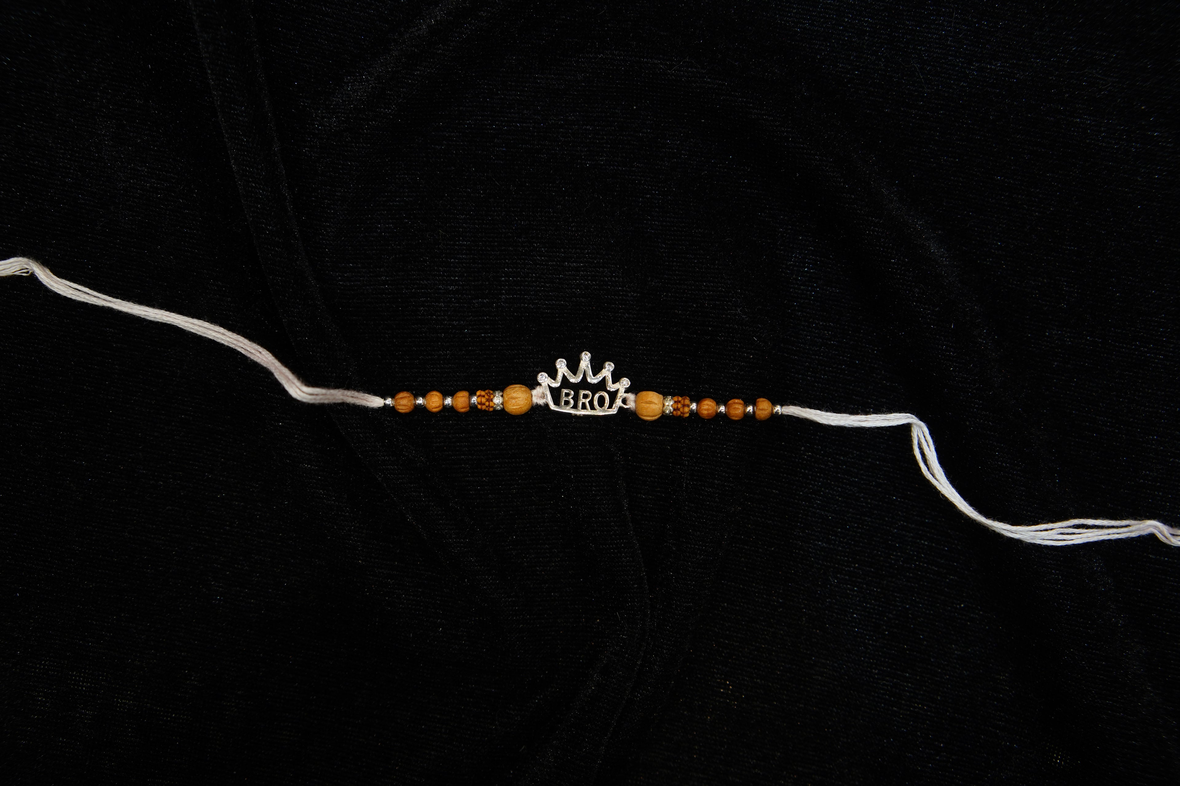 Silver Rakhi with Roli Chawal