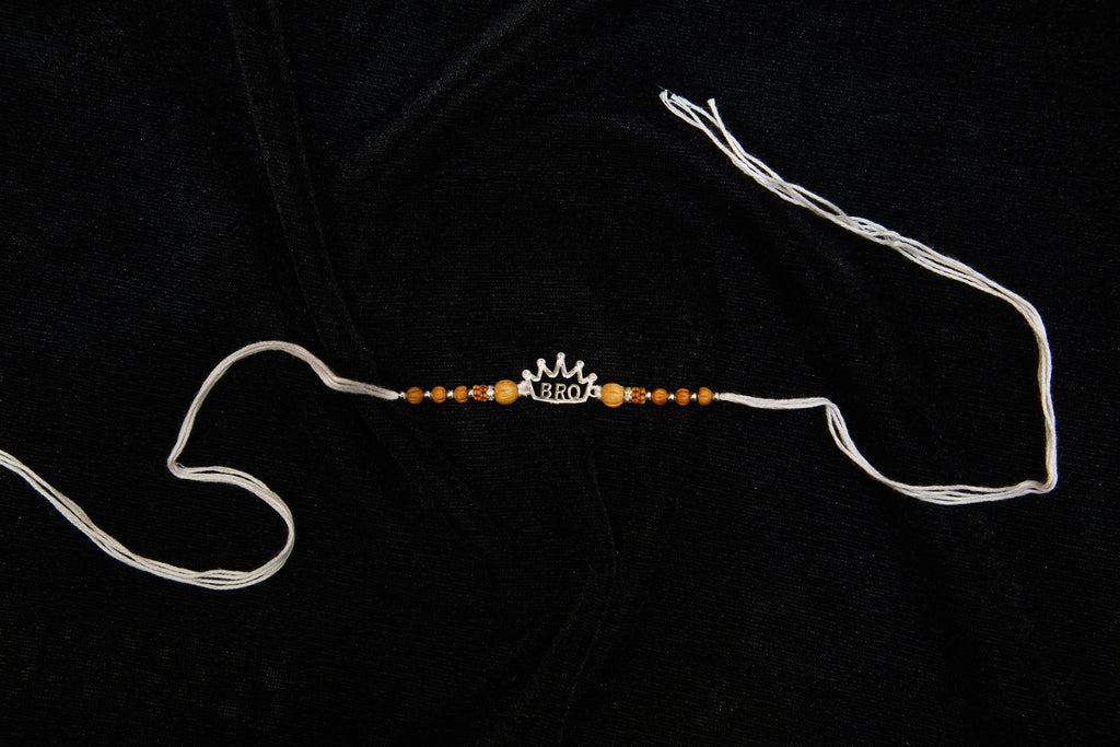 Silver Rakhi with Roli Chawal