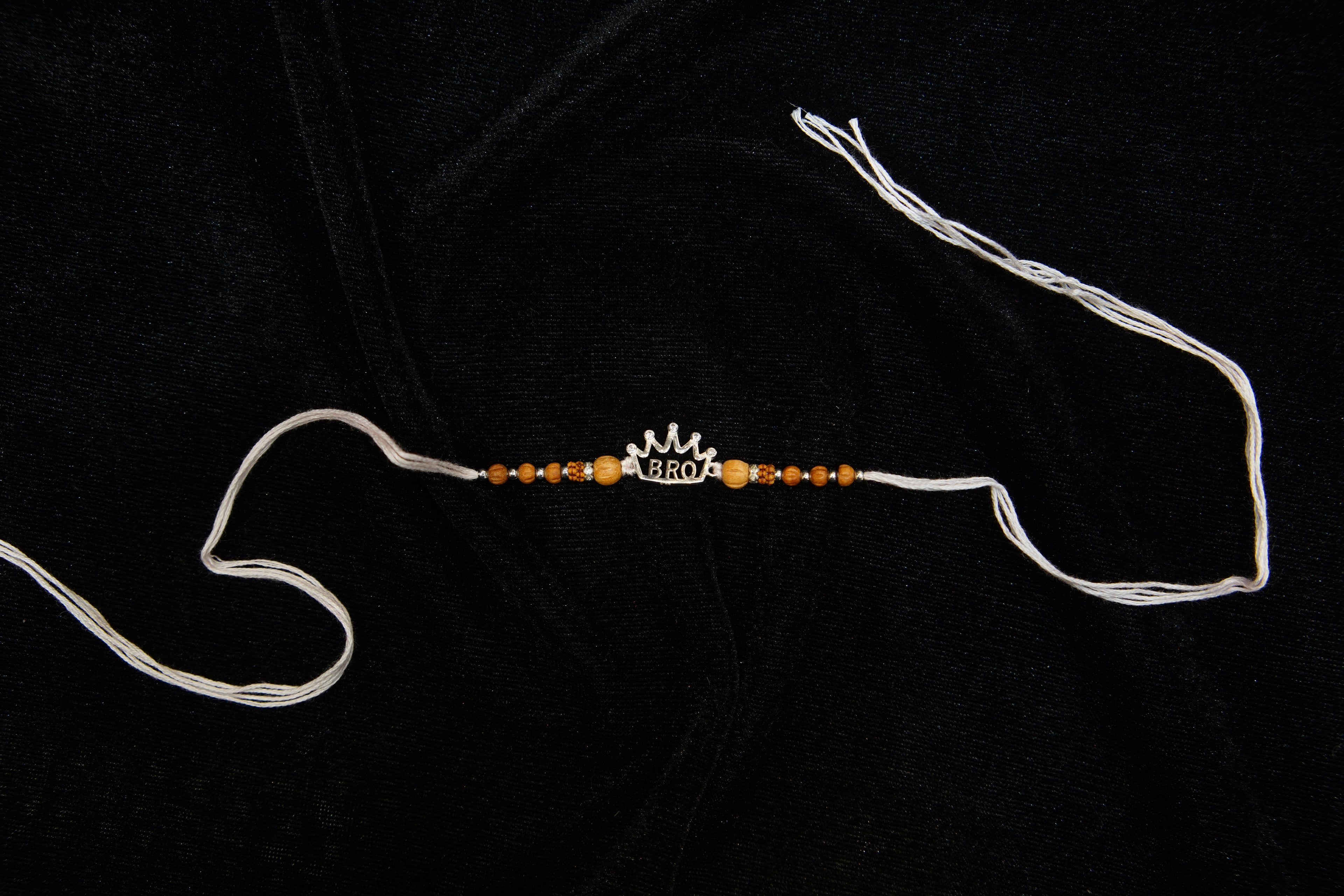 Silver Rakhi with Roli Chawal