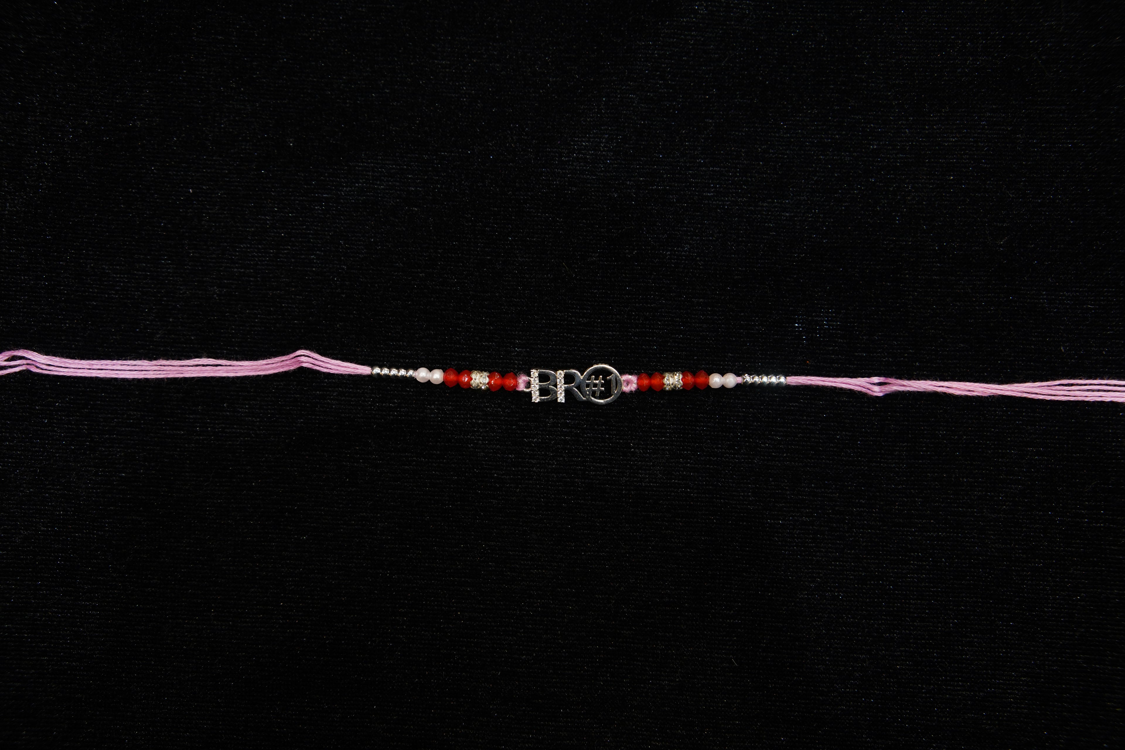Silver Rakhi with Roli Chawal