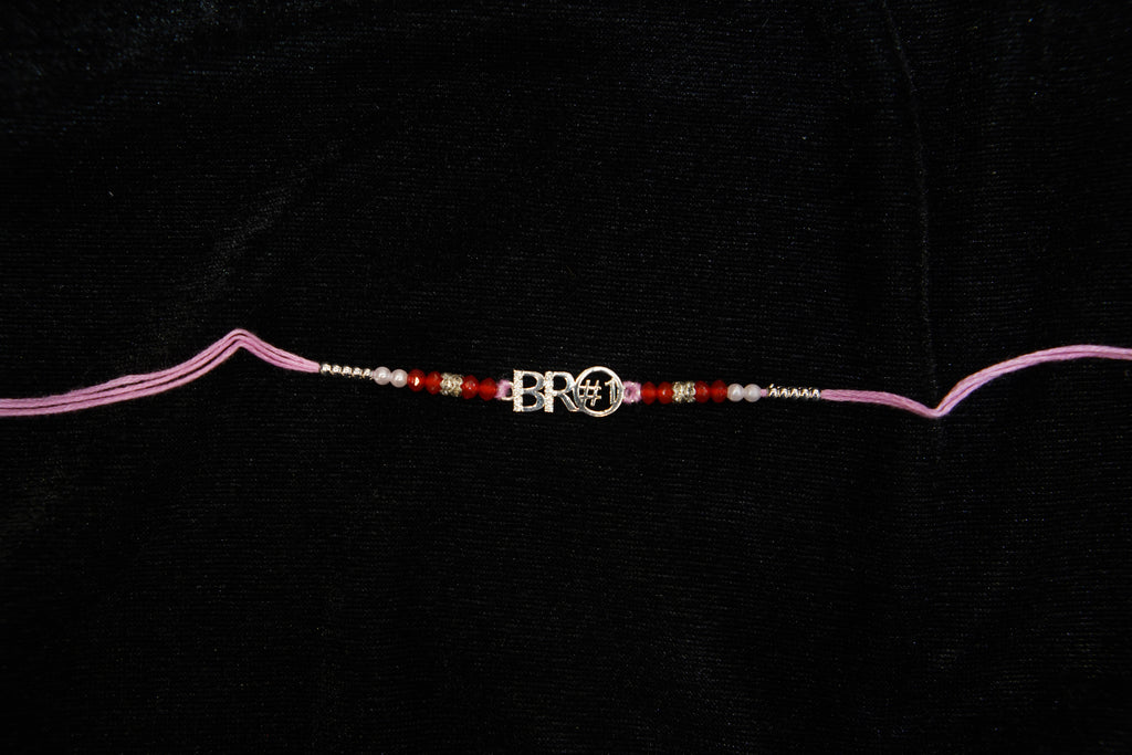 Silver Rakhi with Roli Chawal