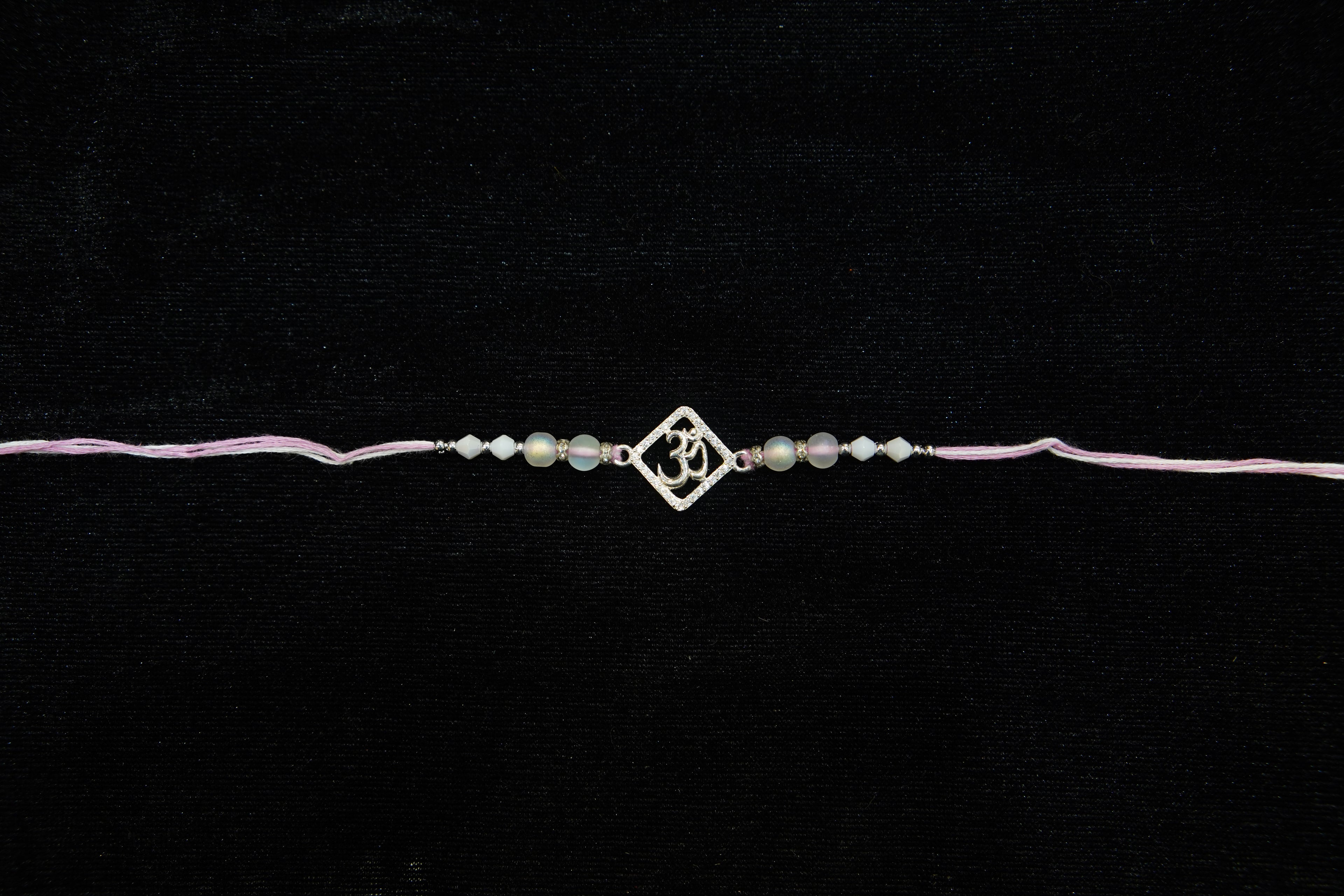 Silver Rakhi with Roli Chawal