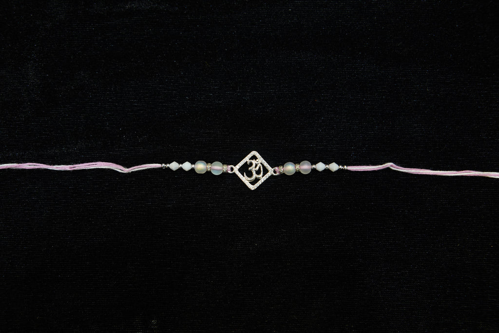 Silver Rakhi with Roli Chawal