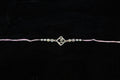 Silver Rakhi with Roli Chawal