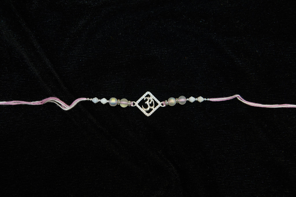 Silver Rakhi with Roli Chawal