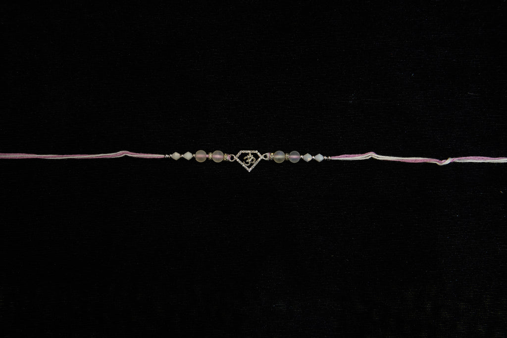 Silver Rakhi with Roli Chawal