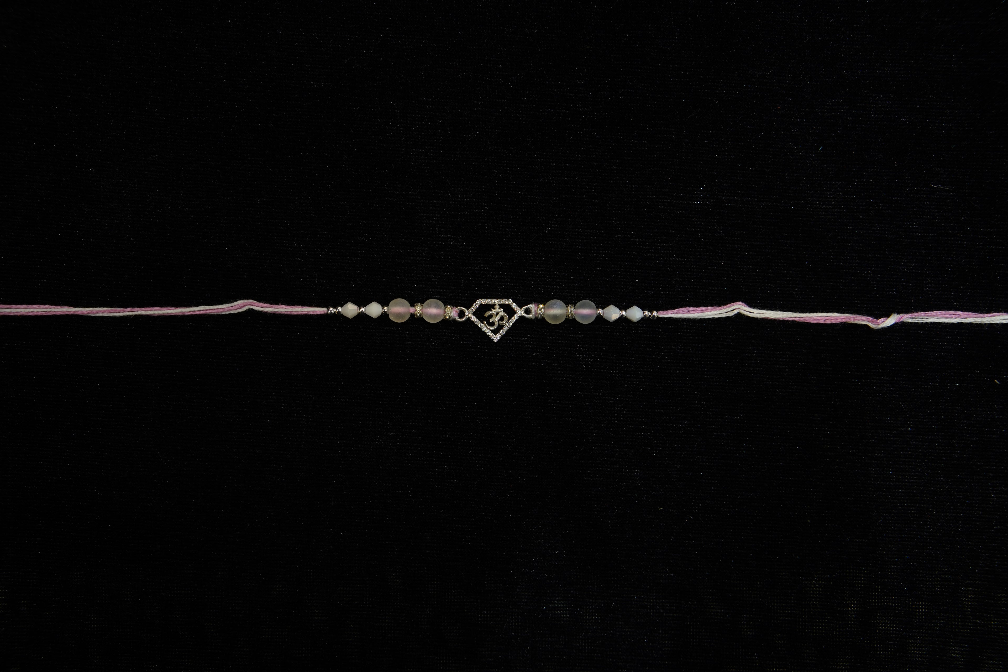 Silver Rakhi with Roli Chawal