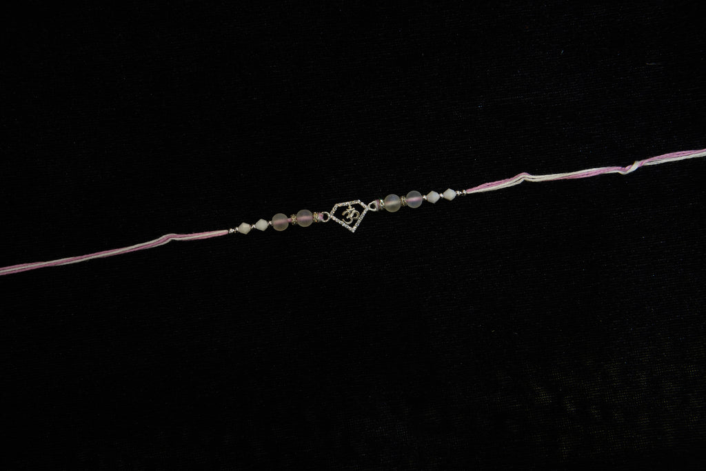 Silver Rakhi with Roli Chawal