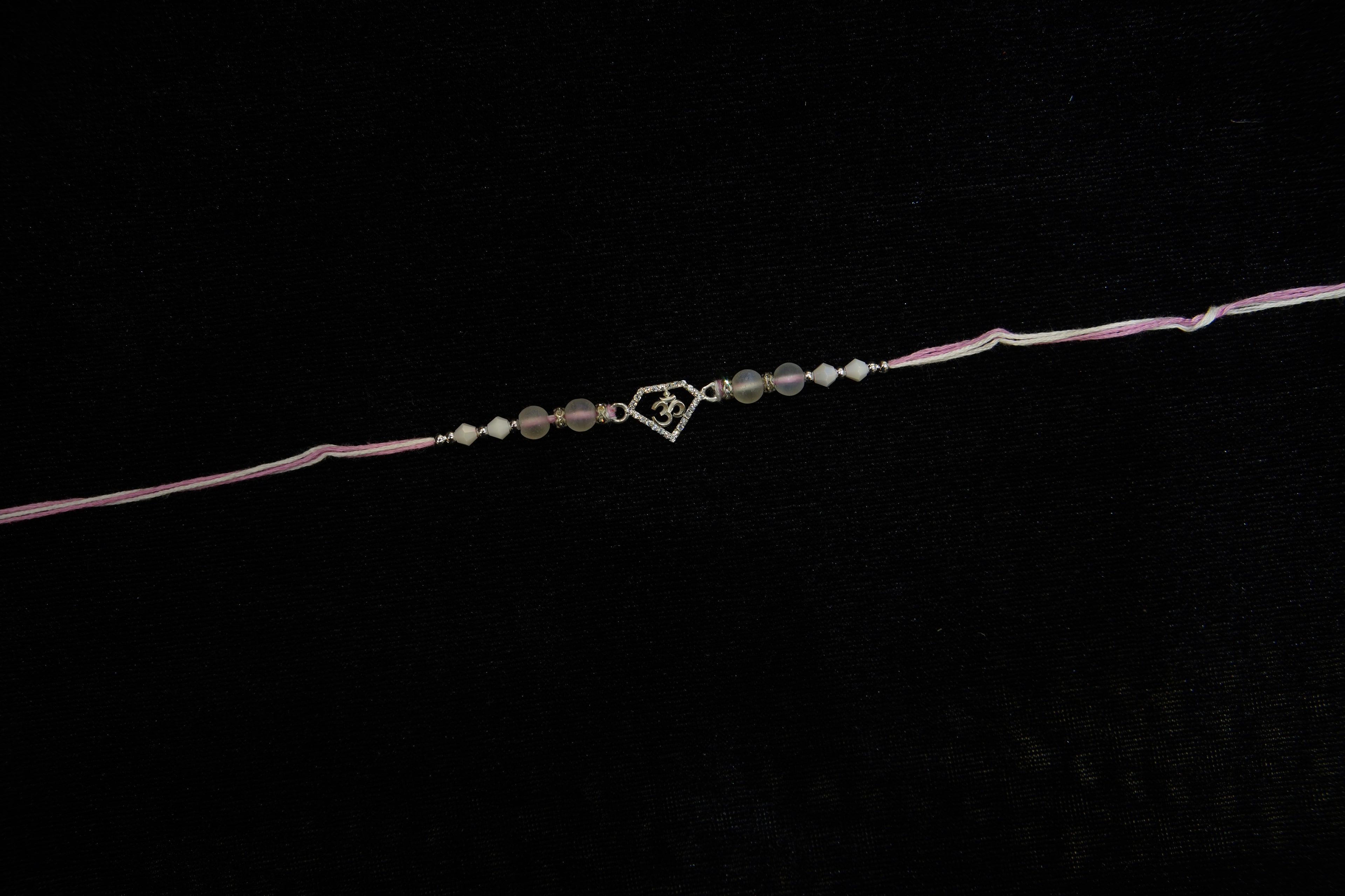 Silver Rakhi with Roli Chawal