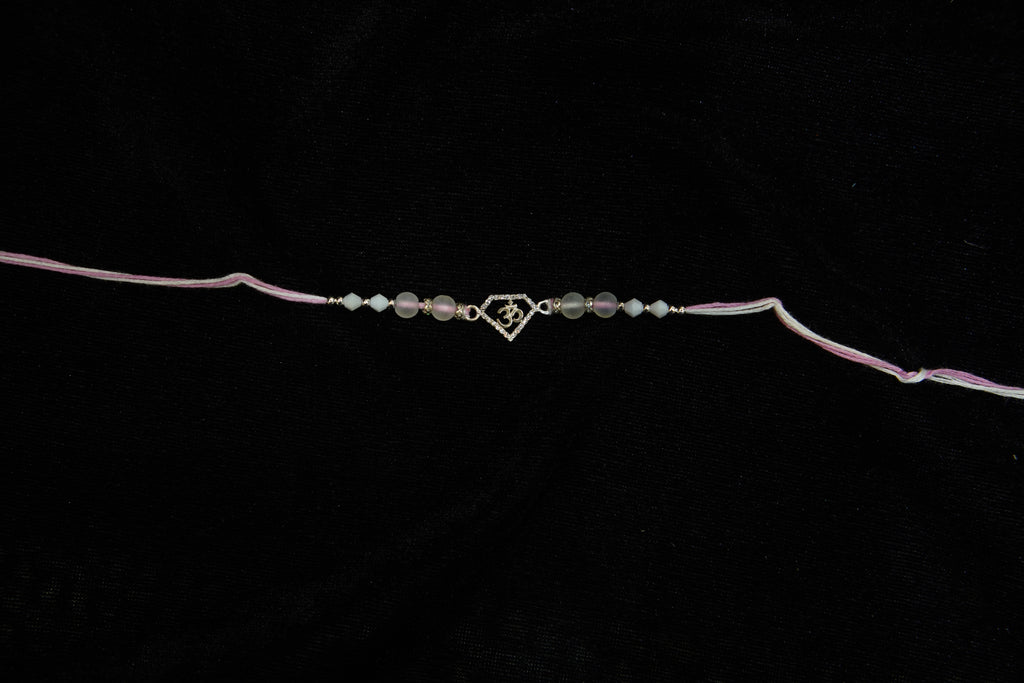 Silver Rakhi with Roli Chawal