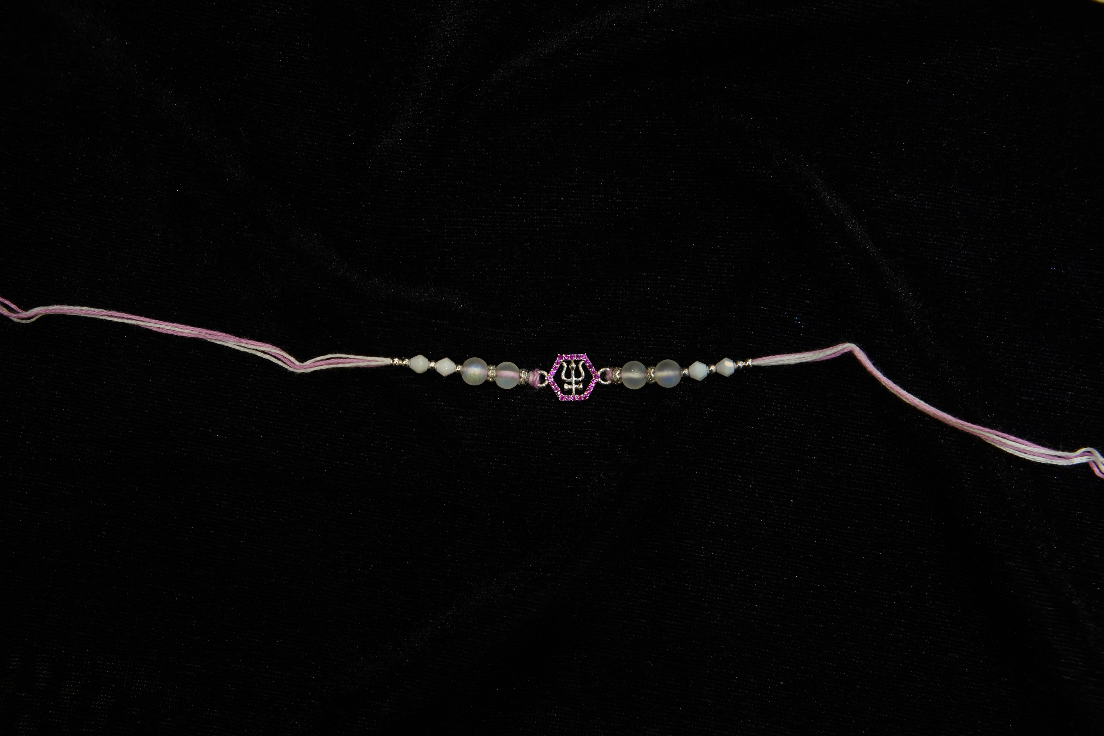 Silver Rakhi with Roli Chawal