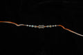 Silver Rakhi with Roli Chawal
