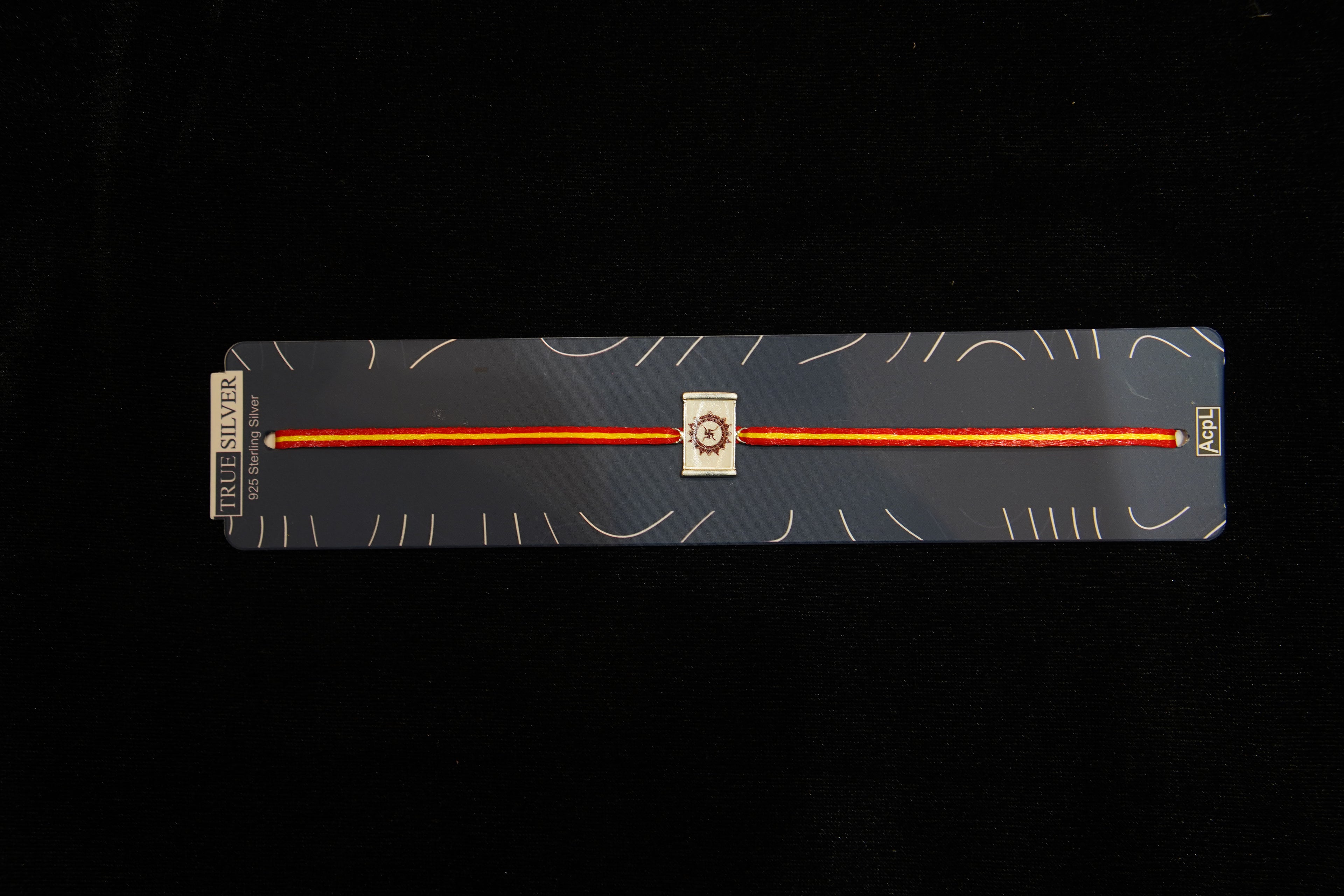 Silver Rakhi with Roli Chawal