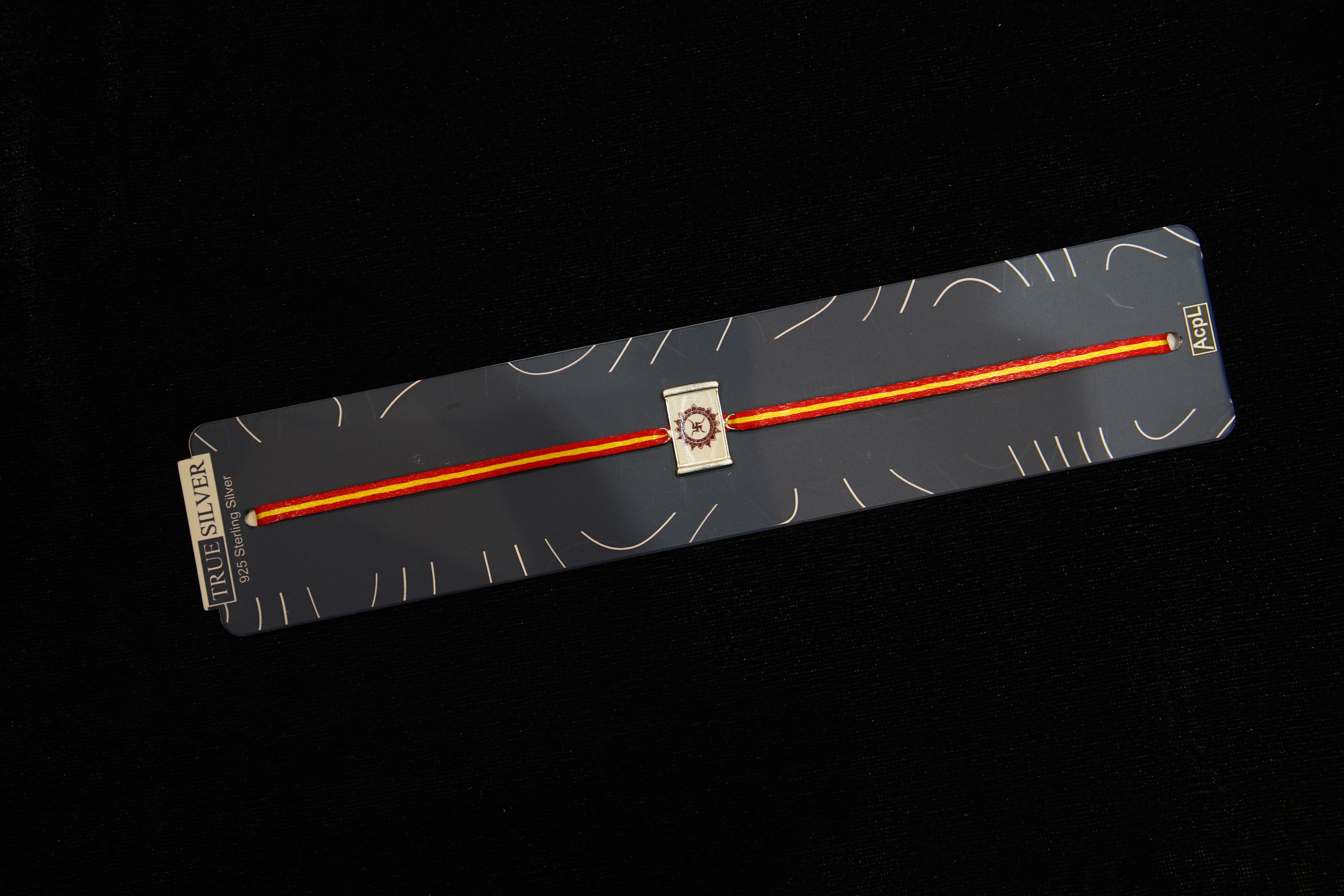 Silver Rakhi with Roli Chawal