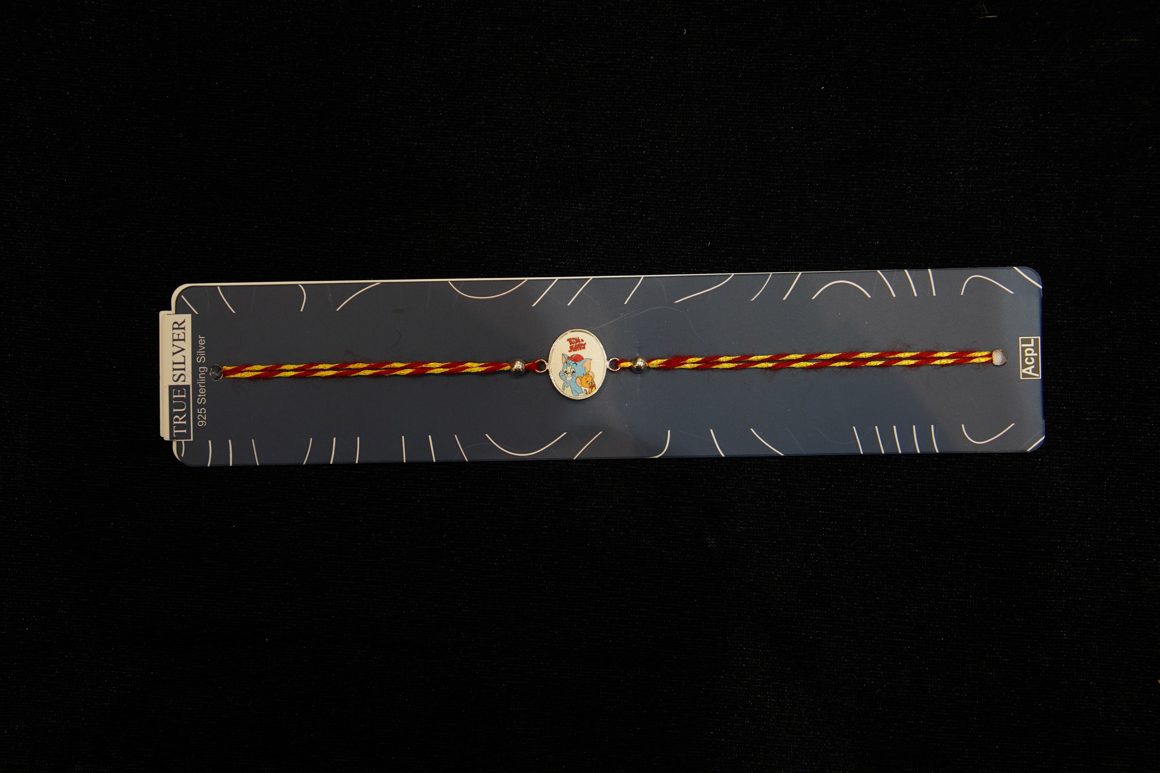Silver Rakhi with Roli Chawal