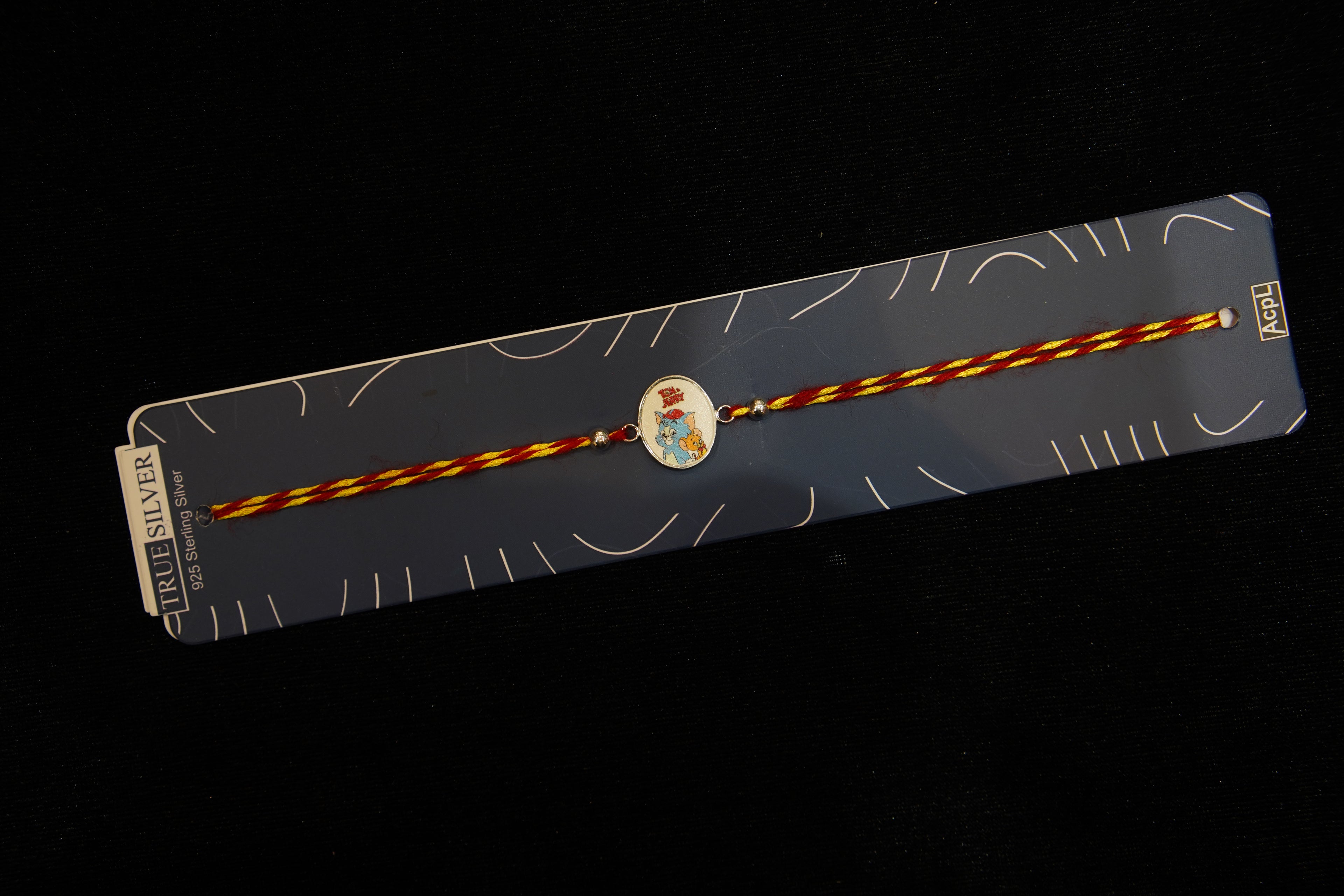 Silver Rakhi with Roli Chawal