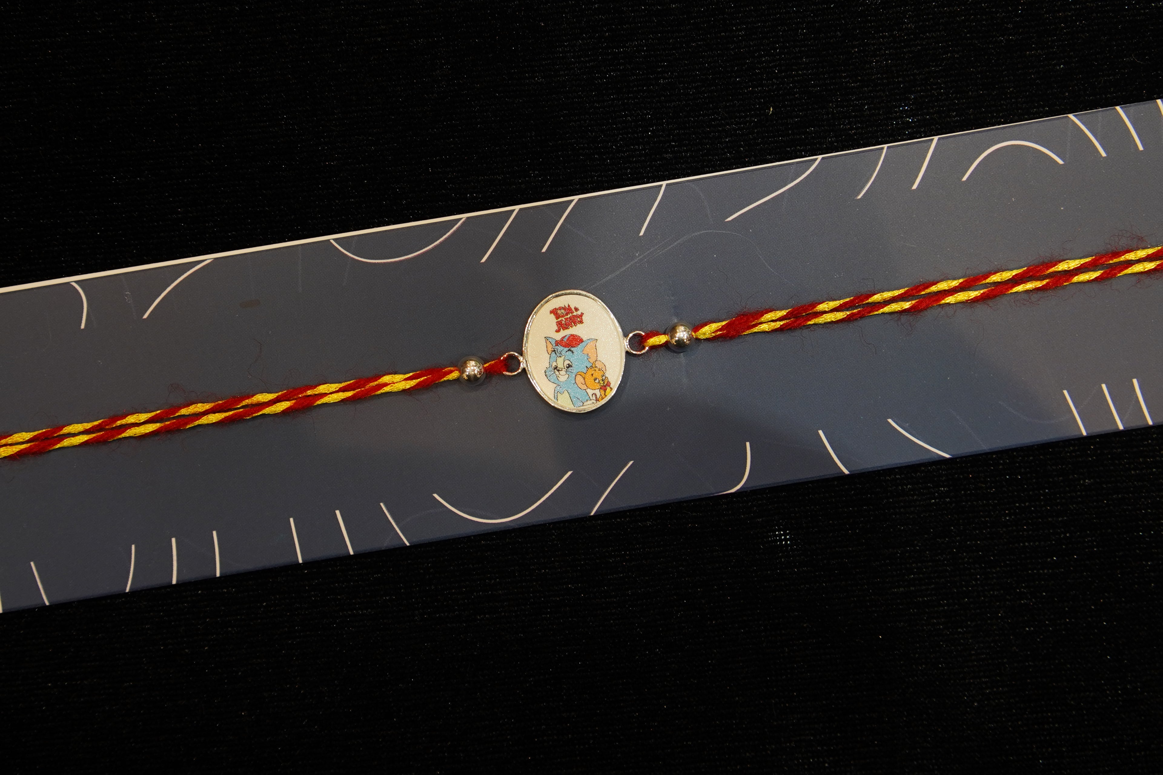 Silver Rakhi with Roli Chawal