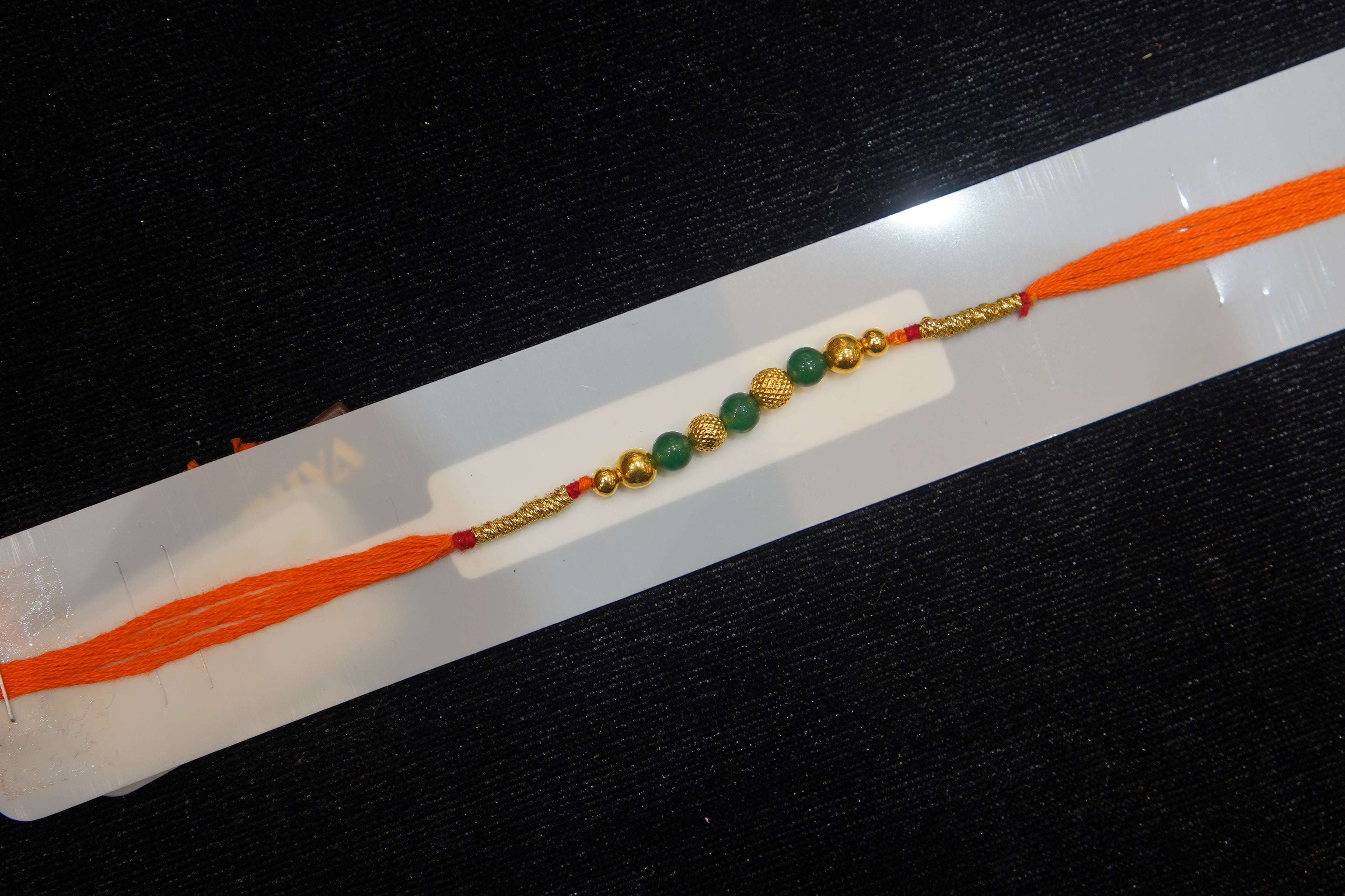 Silver Rakhi with Roli Chawal