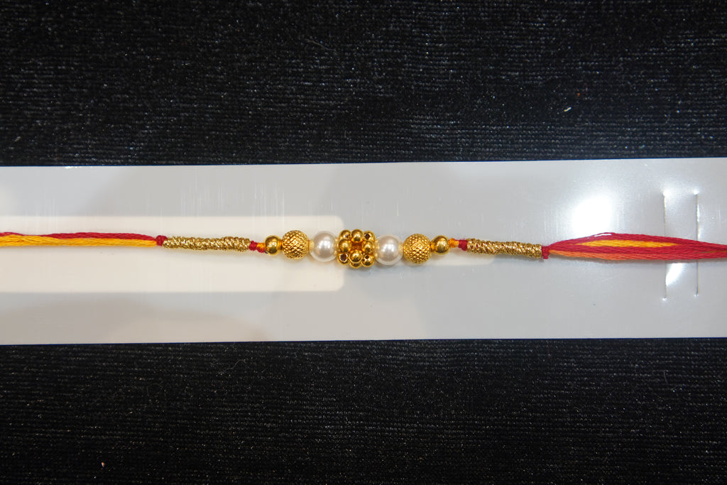 Silver Rakhi with Roli Chawal