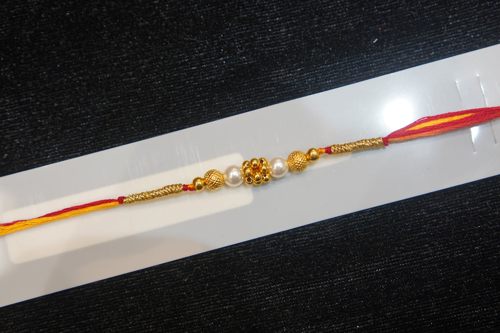 Silver Rakhi with Roli Chawal