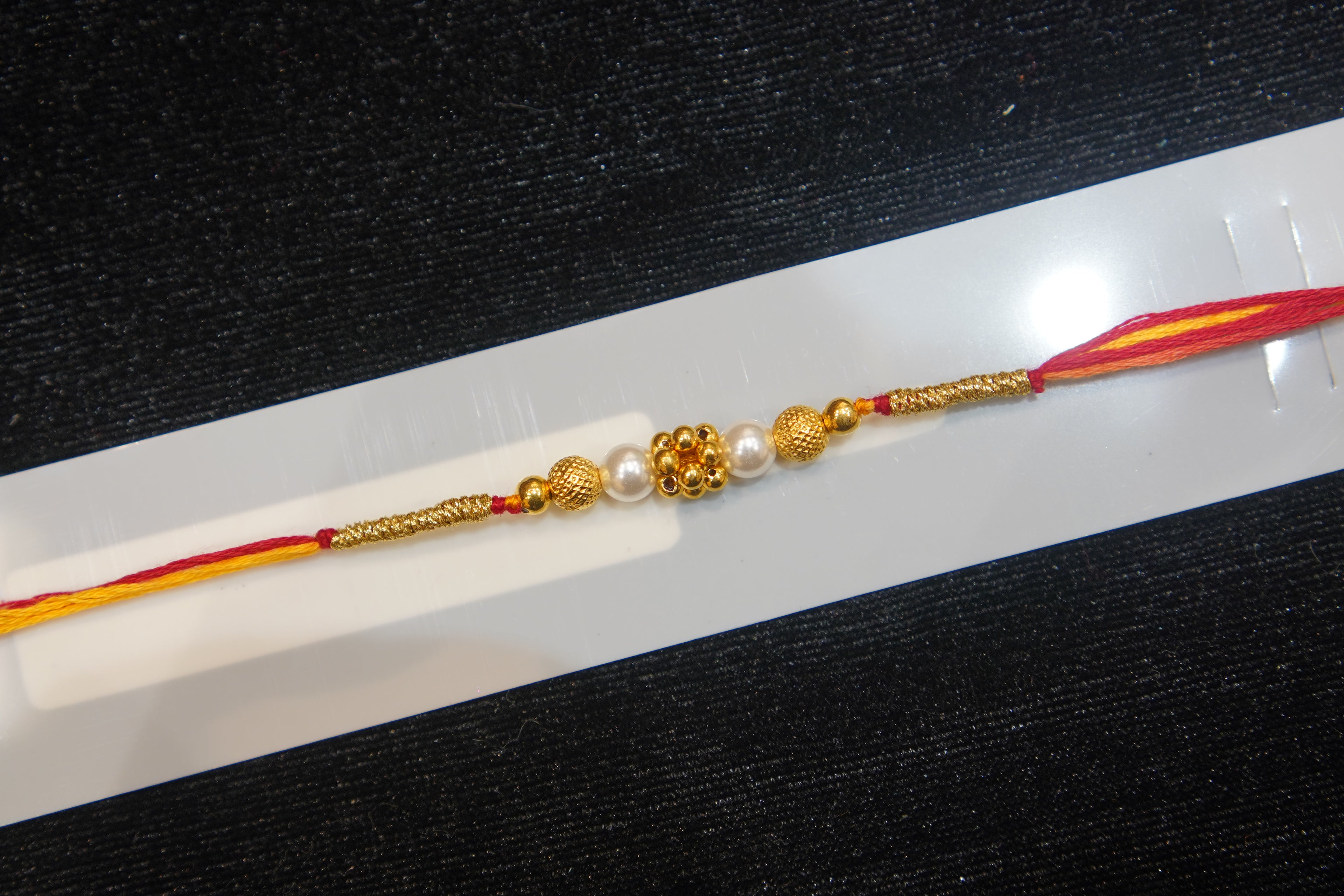 Silver Rakhi with Roli Chawal