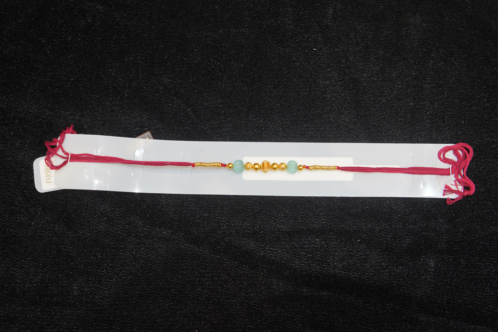 Silver Rakhi with Roli Chawal