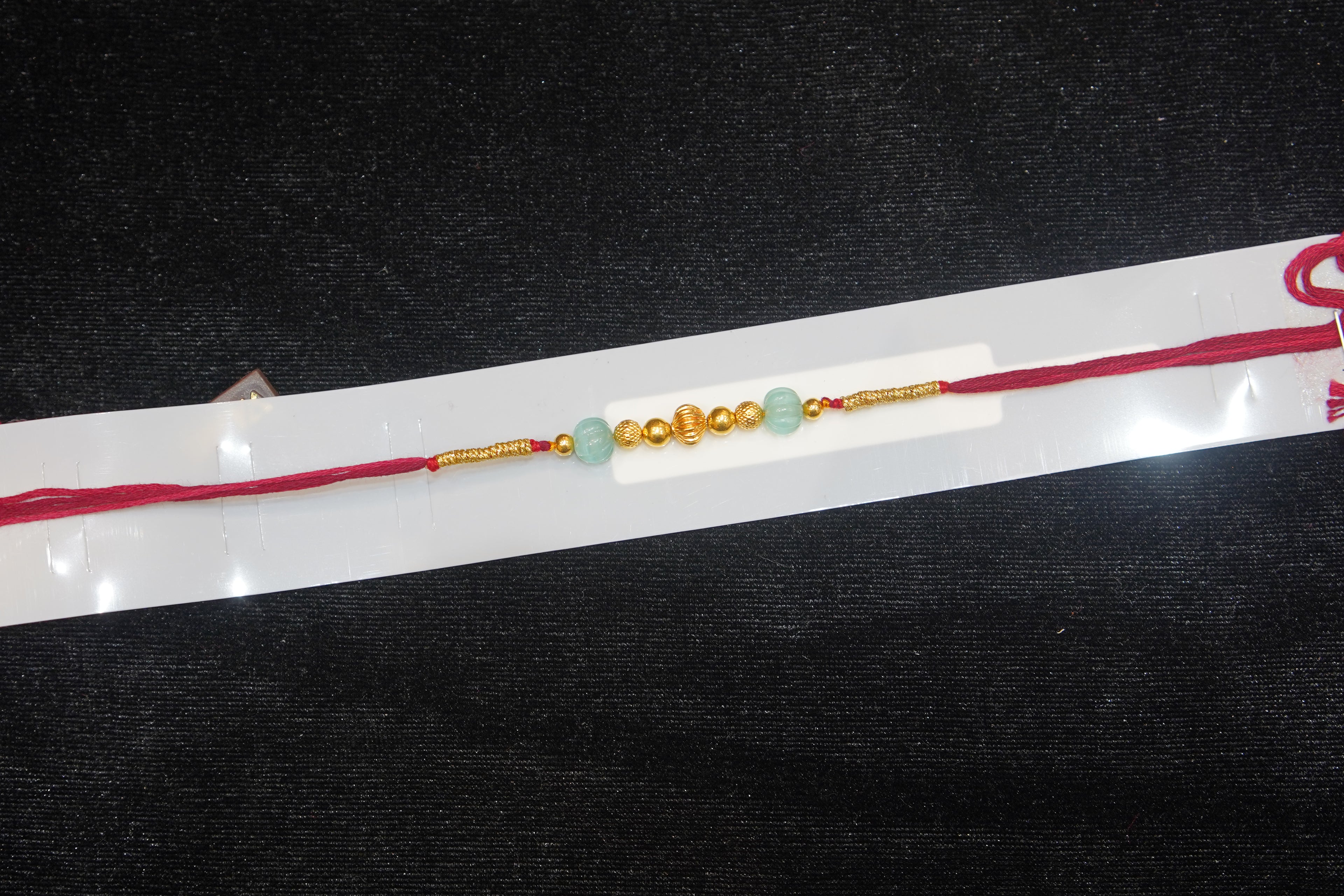 Silver Rakhi with Roli Chawal