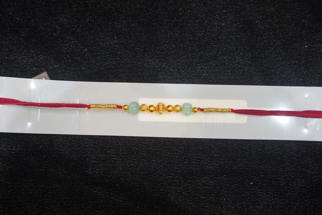 Silver Rakhi with Roli Chawal