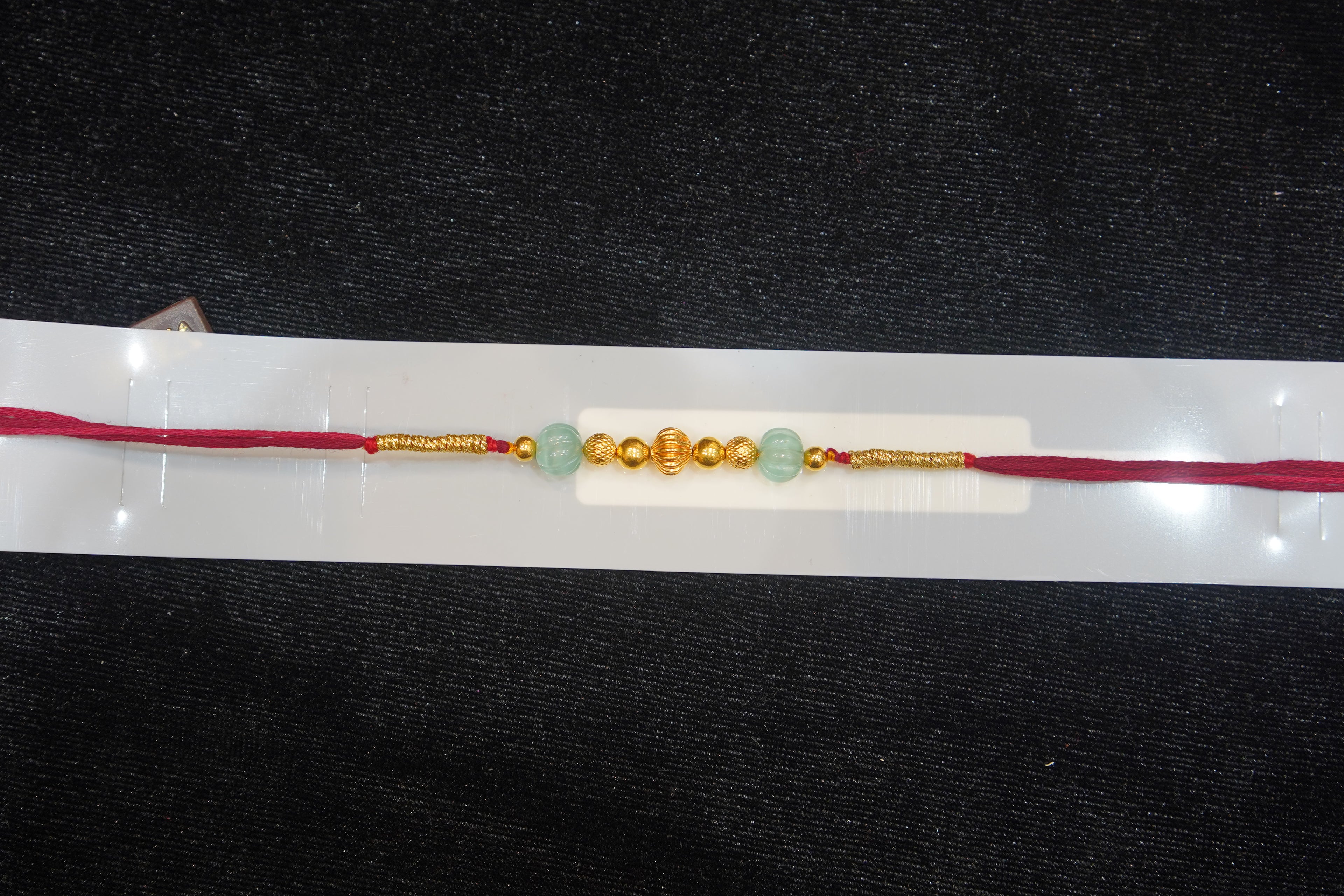 Silver Rakhi with Roli Chawal