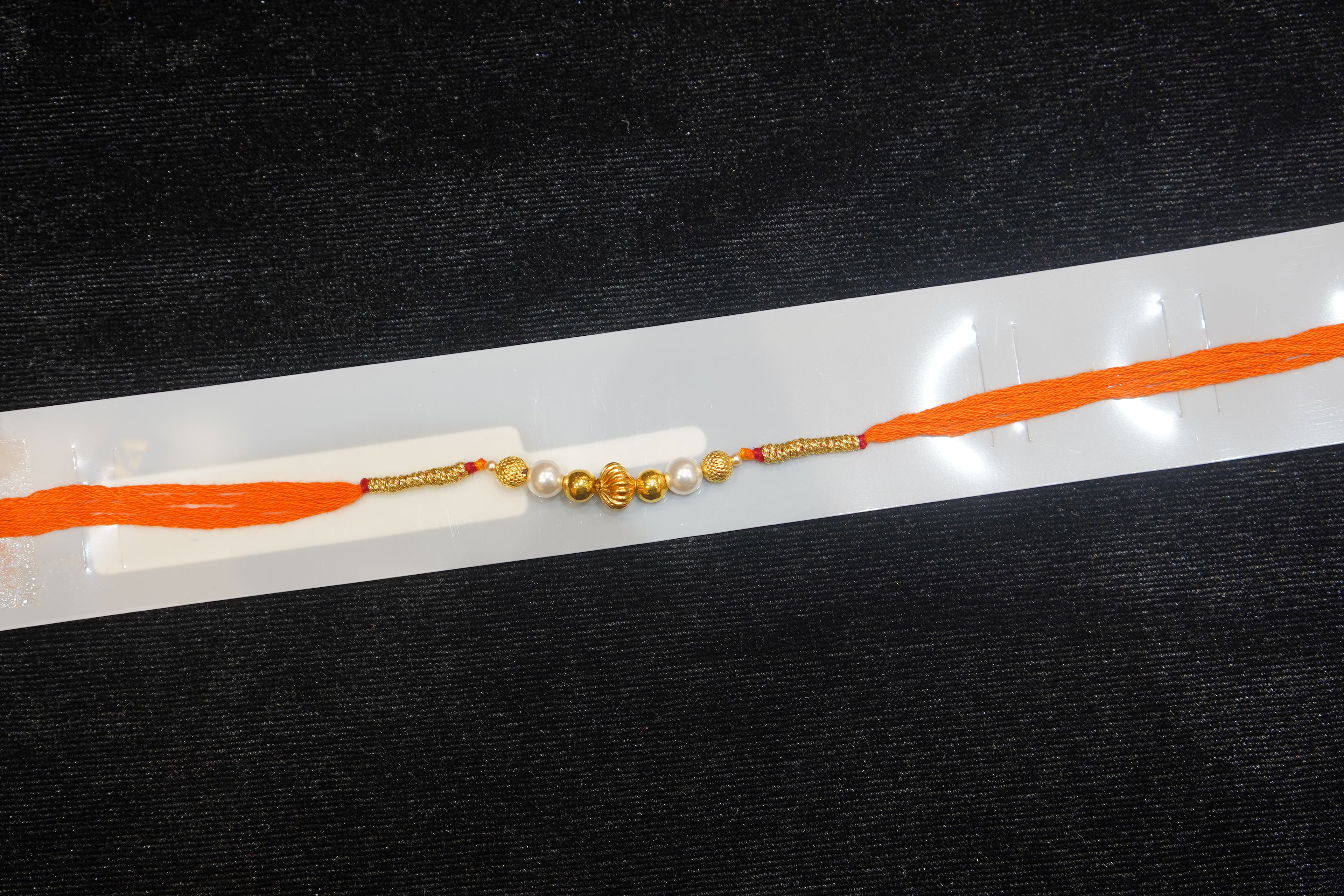 Silver Rakhi with Roli Chawal