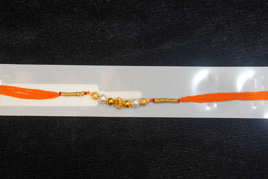 Silver Rakhi with Roli Chawal