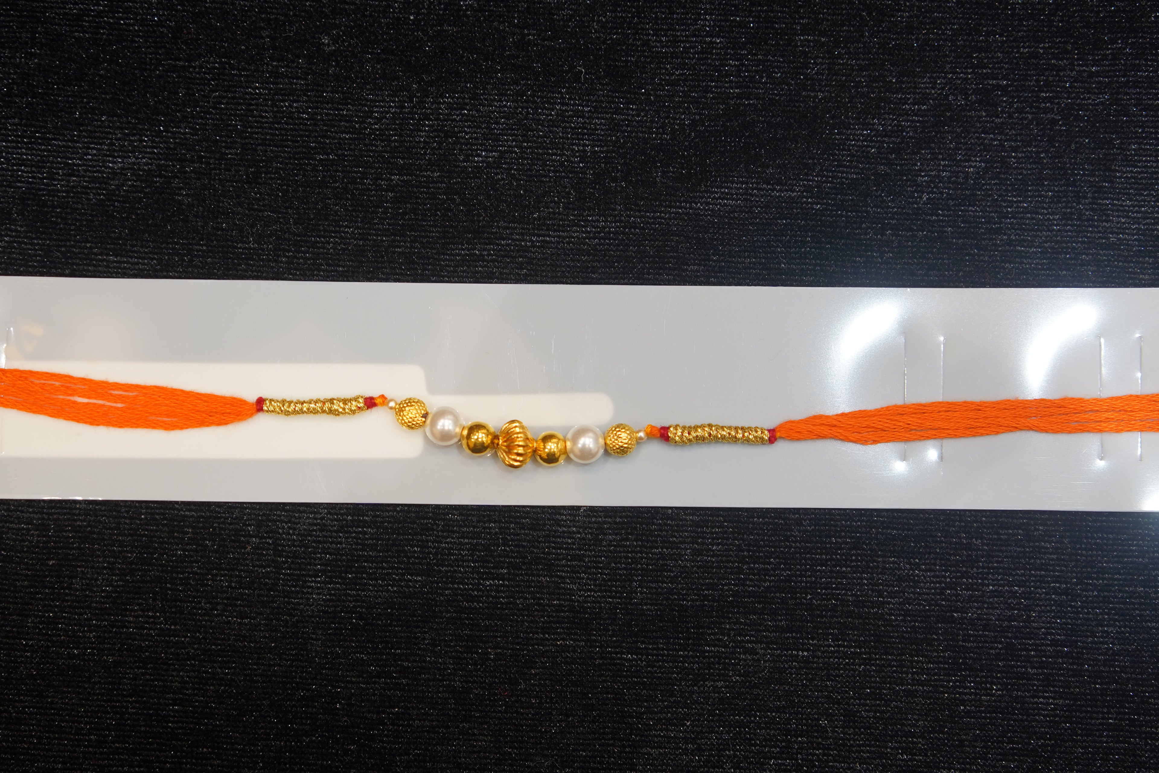 Silver Rakhi with Roli Chawal