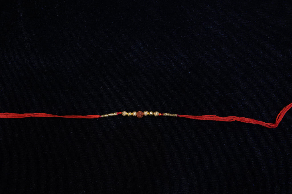 Silver Rakhi with Roli Chawal