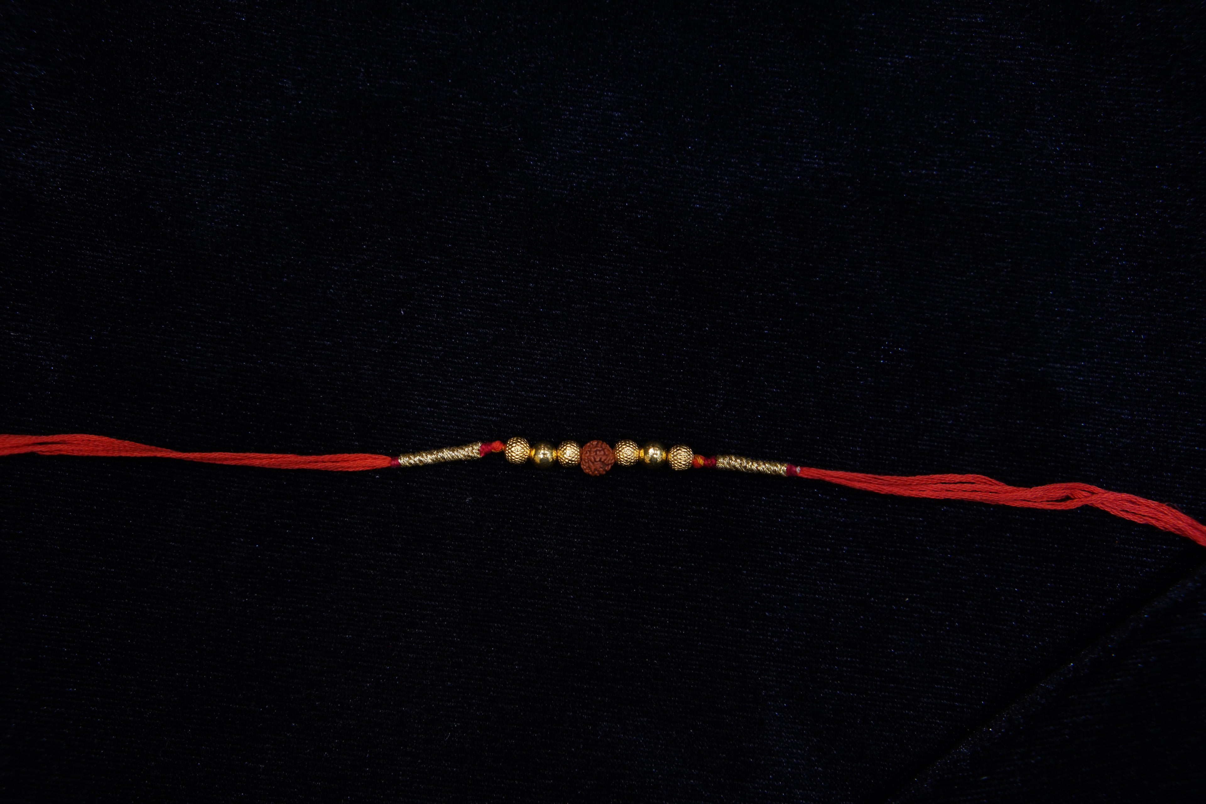 Silver Rakhi with Roli Chawal